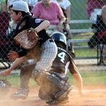 Ben goes for the ball but the runner is safe