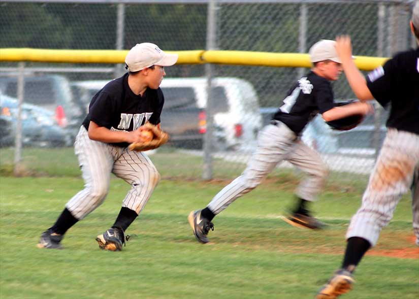 Tanner gets the ball as Hunter runs to cover 1st