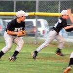 Tanner gets the ball as Hunter runs to cover 1st