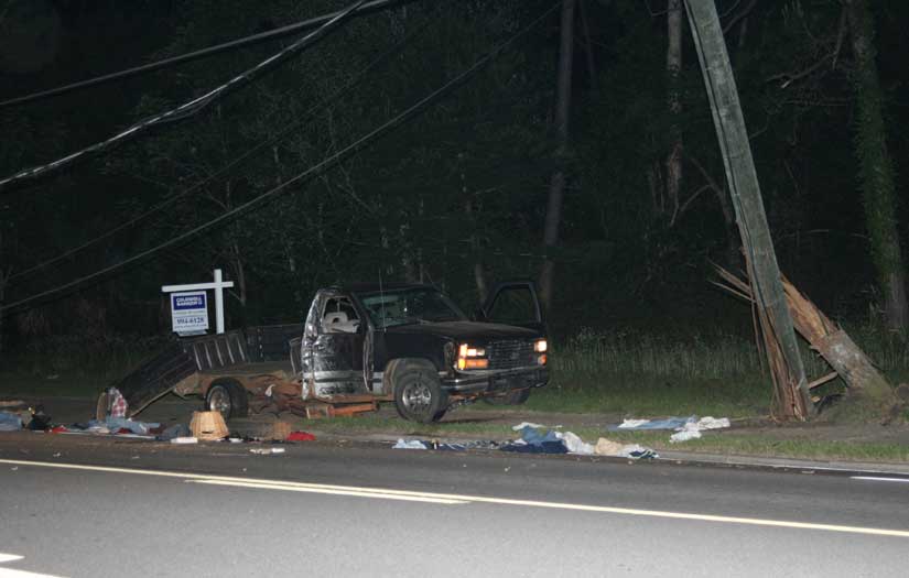 Laundry is scattered around the wreck truck