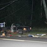 Laundry is scattered around the wreck truck