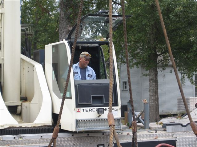 The crane operator takes his work quite seriously.