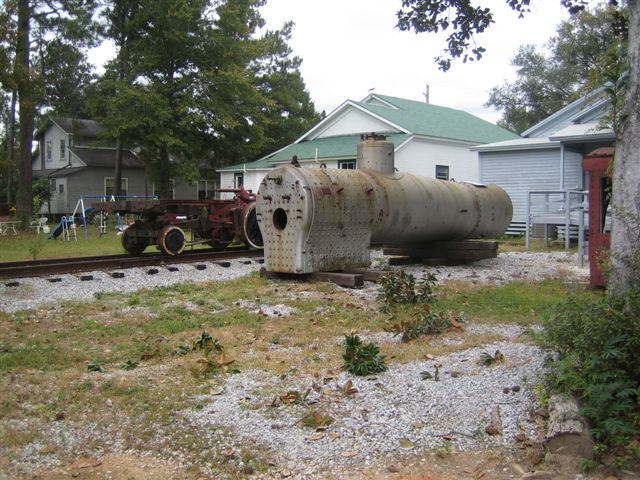 Soon the view toward the back of the ASHS Leach House Museum will resemble a logging train stop.