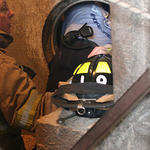 Rescuers Work Inside Access Hole