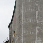 Equipment Being Pulled Up Side Of Silo