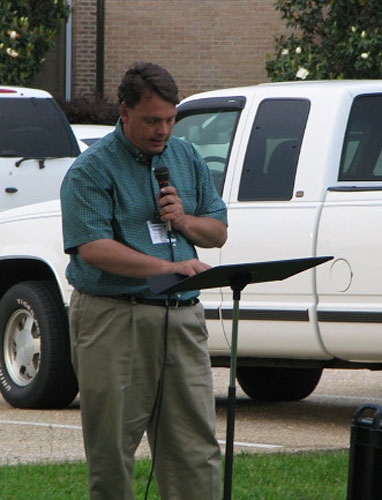 Ryan Carter praying for the media