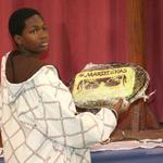 Cake Auction == The Mardi Gras Cake