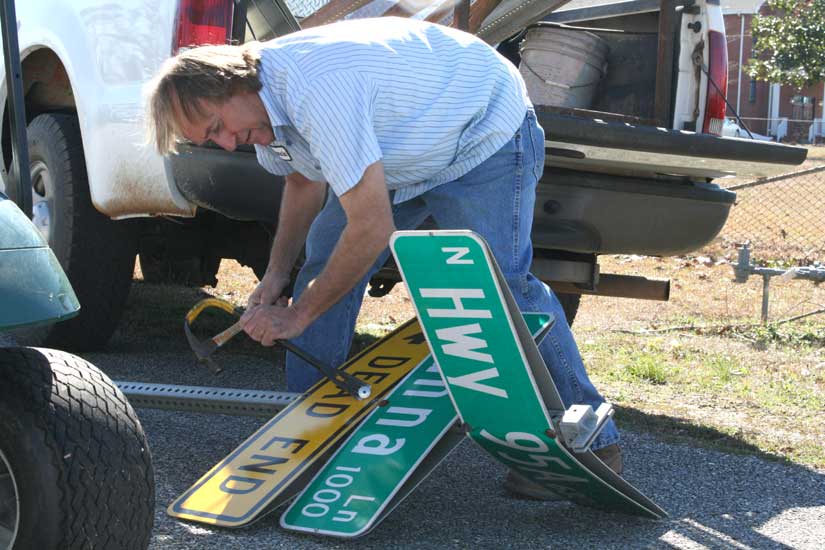 Twisted street sign replaced