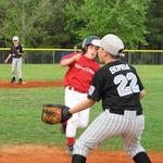 Ethan Bomba tries for the out at 3rd as Hunter Edwards covers 2nd