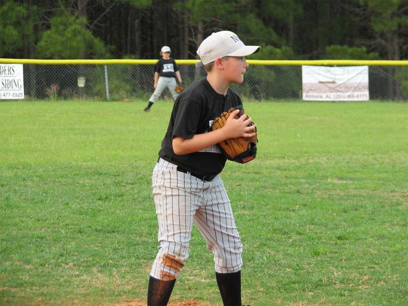 Ethan Bomba covers 3rd and later catches a fly ball for the out