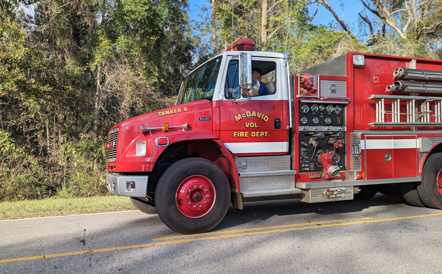 Fire Burns Wooded Area, Pickup Truck Near Davisville