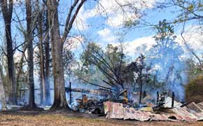 Trash Fire Reignites, Destroys Flomaton Workshop And Tractors