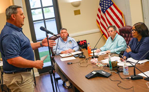 Heated Debate: Public Safety Director Defends North Escambia Ambulance Coverage Amid Resident Concerns