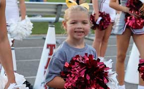 Living Her Best Life: Childhood Cancer Survivor Cheers Alongside Tate Aggies