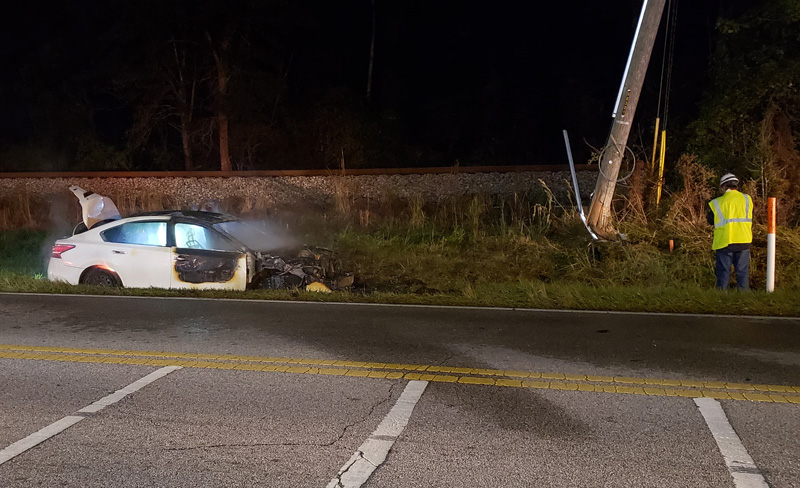 Vehicle Burns After Crashing Into Utility Pole On Highway 95A ...